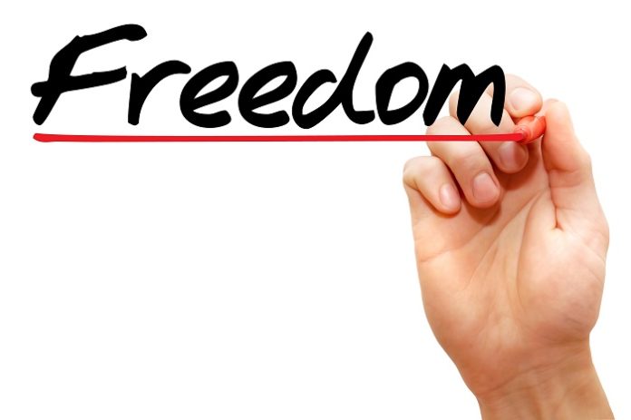 Hand writing Freedom, business concept Borçlar siliniyor