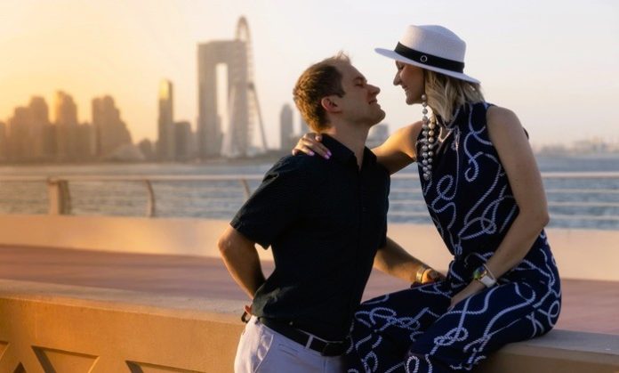 romantic couple resting by the sea